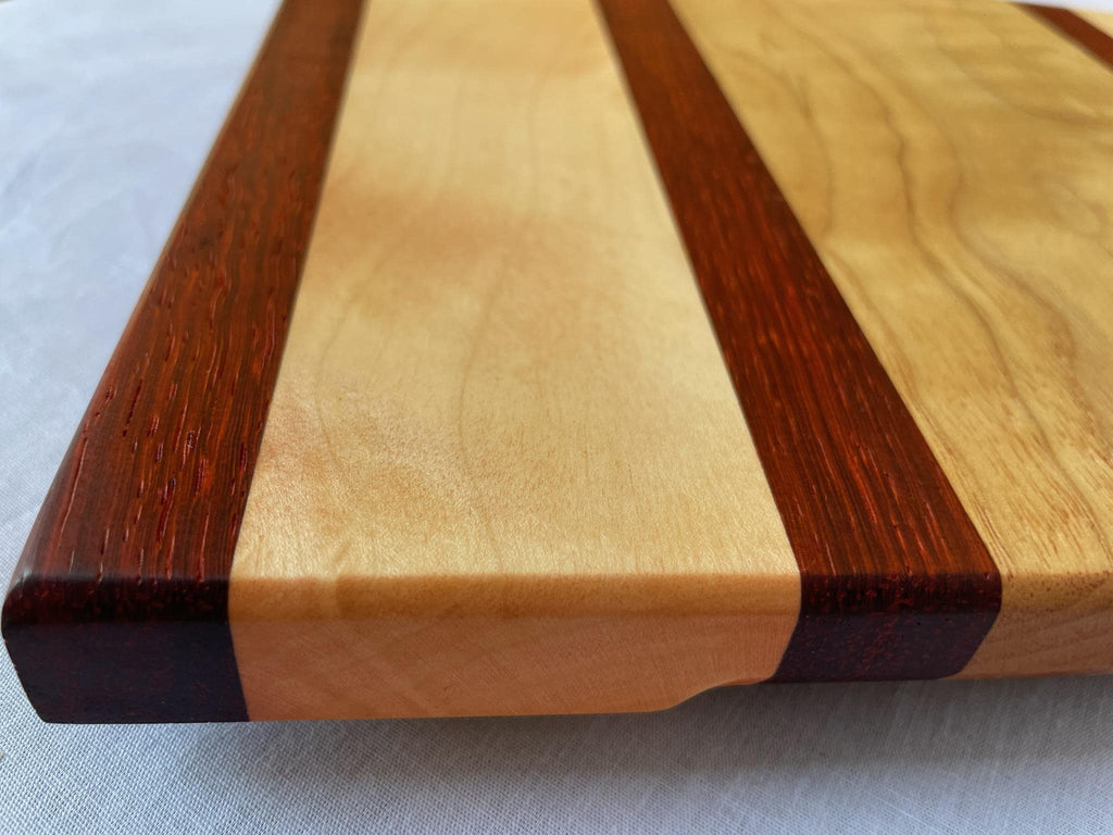 Padauk Maple and Walnut Cutting Board, Bold Handmade Wooden Chopping Board with Striking Grain, Kitchen Gift, Made in the Netherlands
