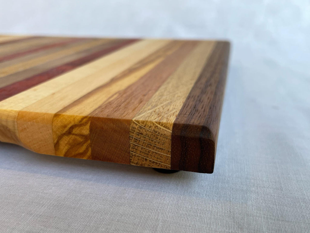 Eight-Wood Cutting Board, Lightweight Handmade Board in Oak, Cherry, Olive, Padauk & Walnut, Colourful Kitchen Gift, Made in the Netherlands