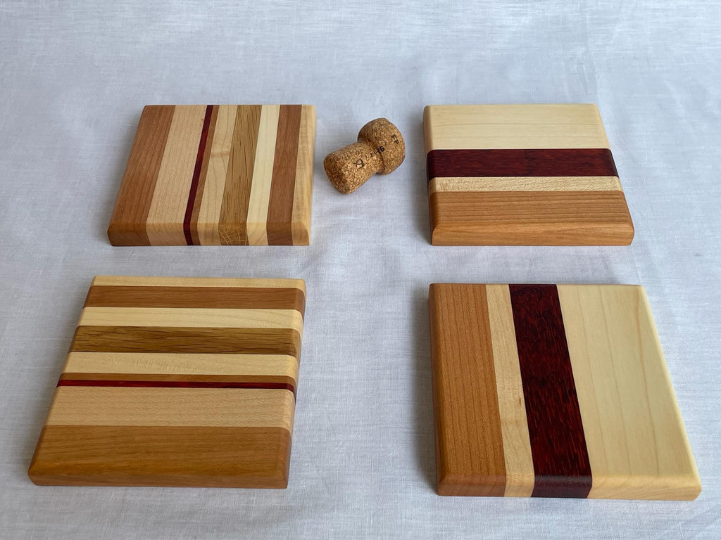 Wooden Coaster Set of 4, Handmade Six-Wood Drink Coasters in Ash, Cherry, Maple, Oak & Padauk, Housewarming Gift, Made in the Netherlands